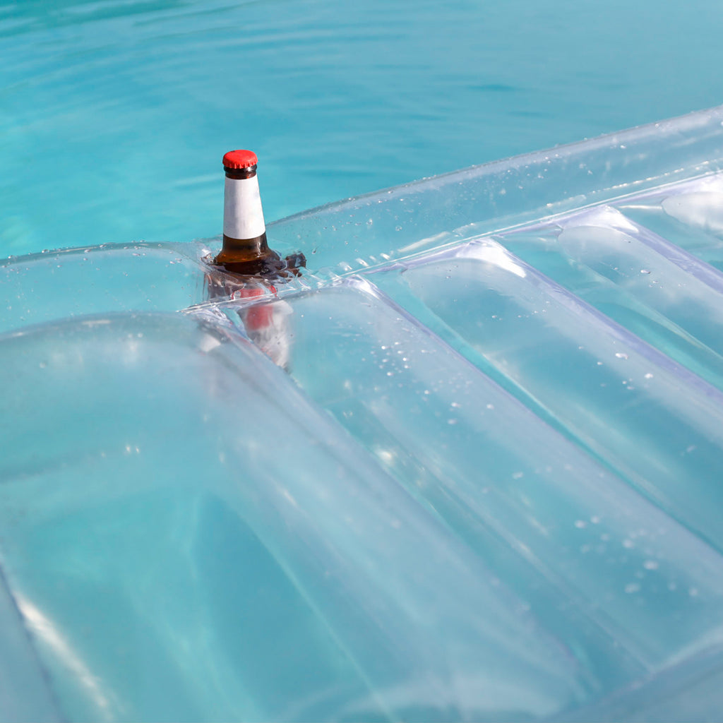Lôteli's clear lounger pool floats have built-in cupholders so your party doesn't stop