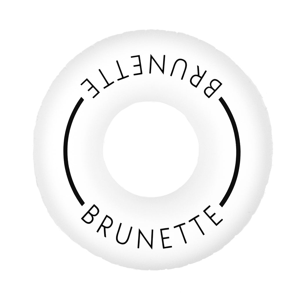 Aerial photo of white pool swim ring with the word brunette on it with a white background. 